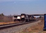 NS 6657 leads a train southbound